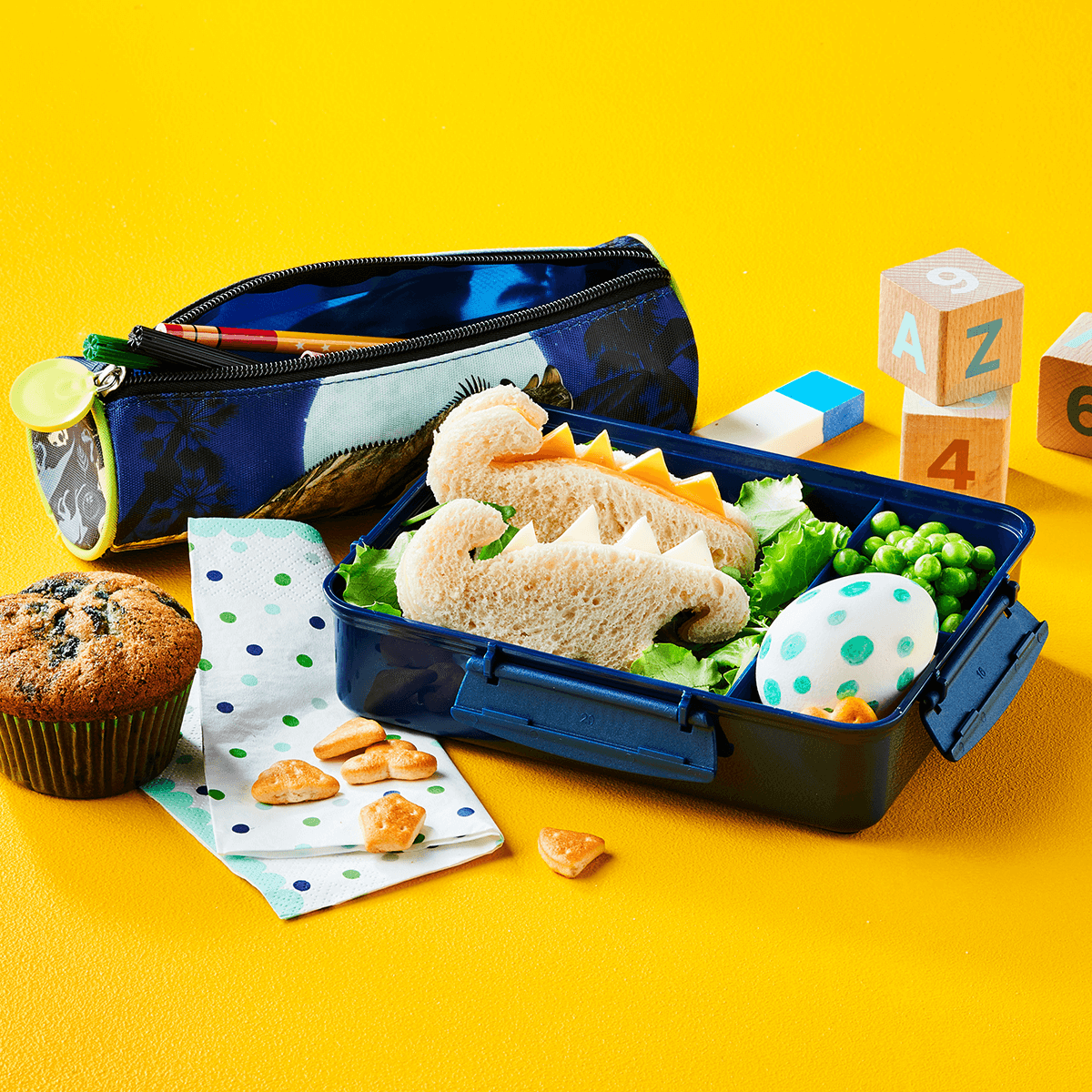 Dino Lunch Box with Blueberry Muffin - Emborg