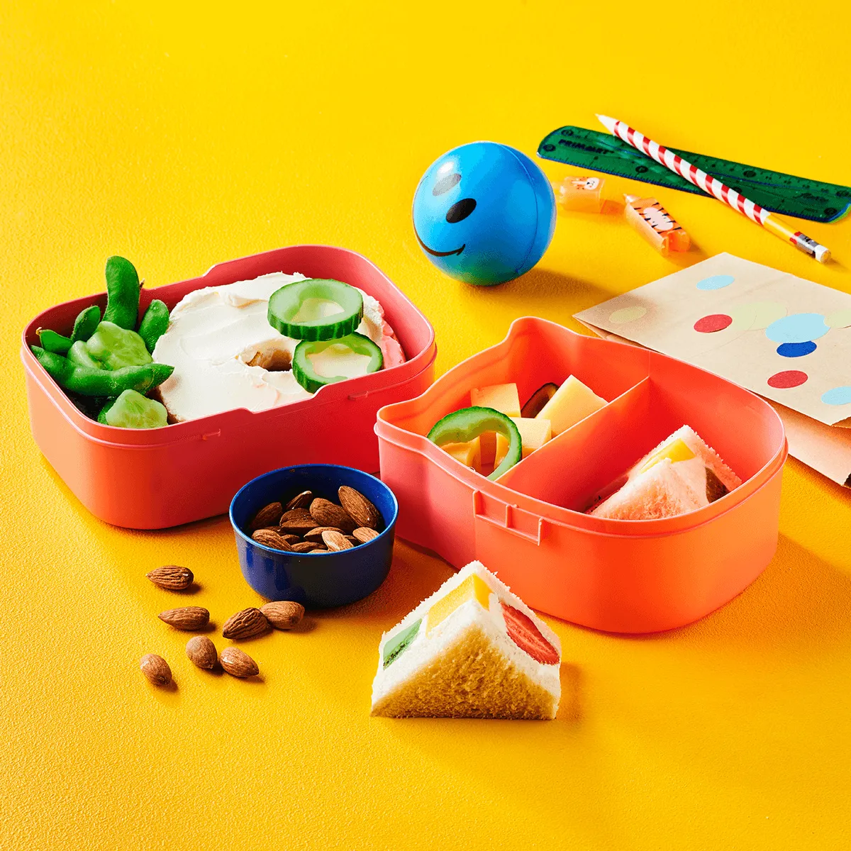 Lunch Box with Cream Cheese Bagel, Japanese Fruit Sandwich and Pesto Swirls - Emborg