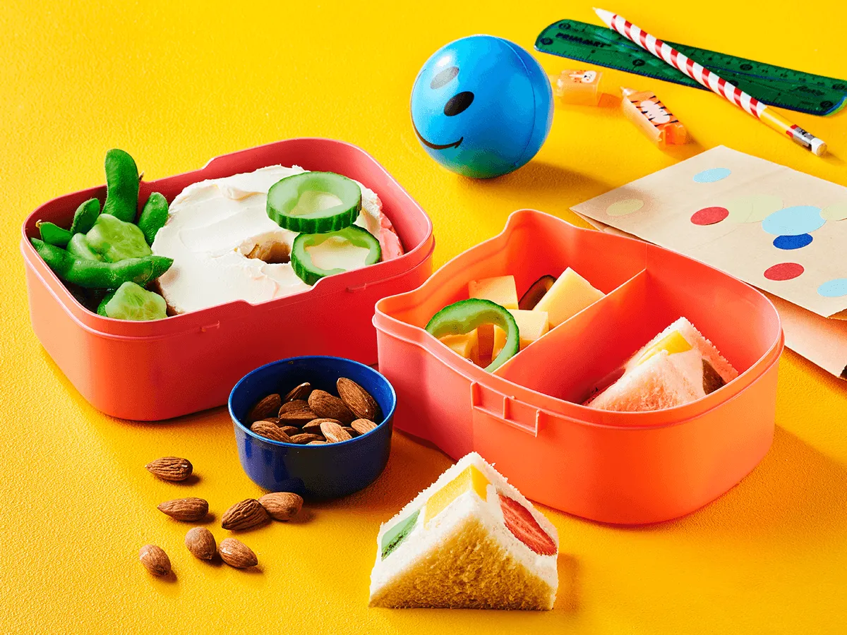 Lunch Box with Cream Cheese Bagel, Japanese Fruit Sandwich and Pesto Swirls - Emborg