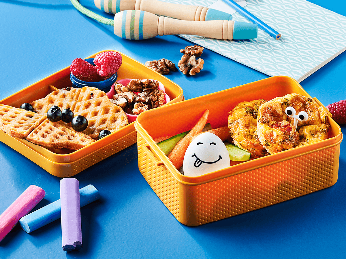 Lunch Box with Egg Muffins, Blueberry Waffles and Snacks - Emborg