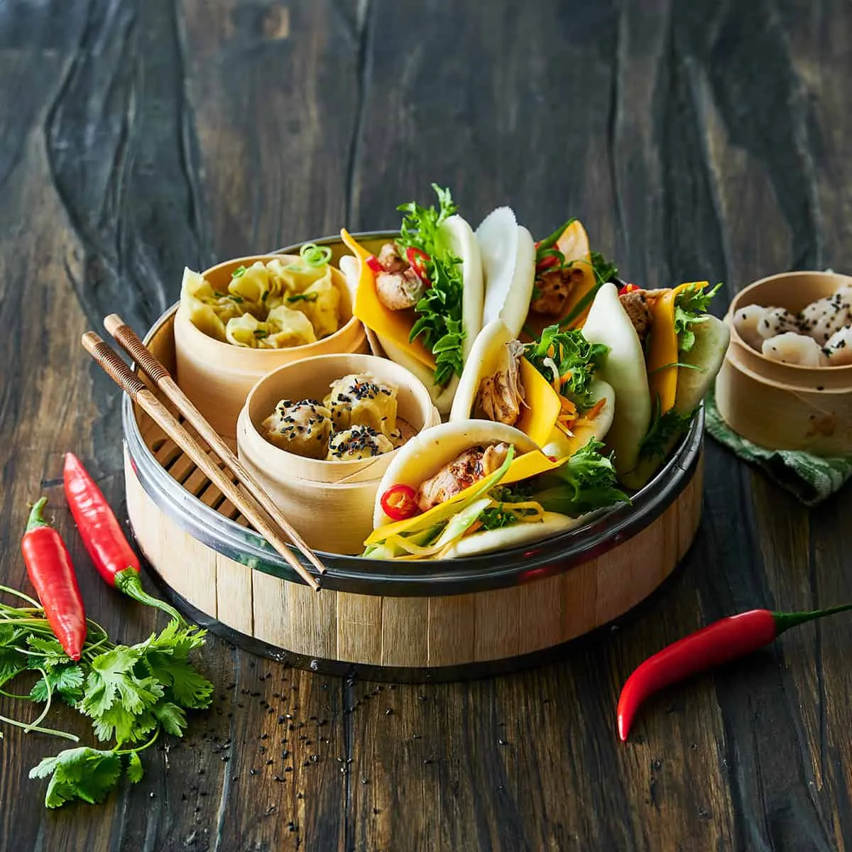 Sharing Plate with Dumplings, Wontons and Bao Buns with Cheese - Emborg 