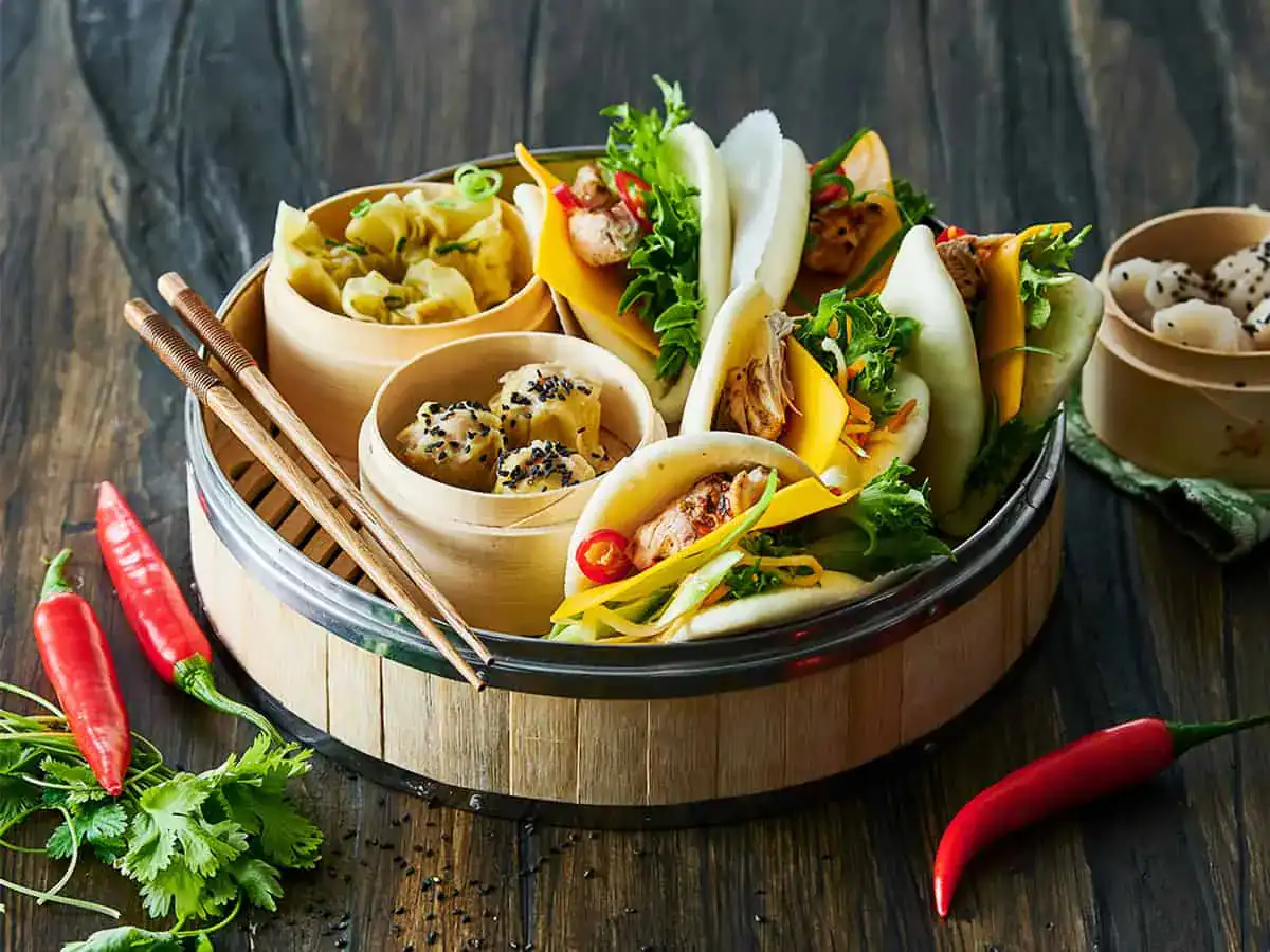Sharing Plate with Dumplings, Wontons and Bao Buns with Cheese - Emborg 
